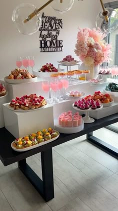 a table filled with lots of desserts and drinks