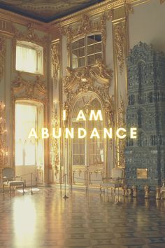 the words i am abundance are in front of an ornate room