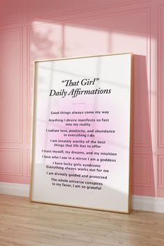 a pink room with a framed poster that says,'data girl daily affirmationss '