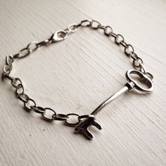 Skeleton Key Layering Bracelet / Silver by lydiasvintage on Etsy https://www.etsy.com/listing/210083067/skeleton-key-layering-bracelet-silver Layered Silver Bracelets, Skeleton Key Jewelry, Skeleton Bracelet, Key Bracelet, Key Jewelry, Silver Key, Steampunk Jewelry, Skeleton Key, Wishful Thinking