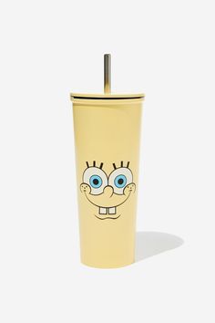 a yellow cup with a face drawn on it and a straw sticking out of the top