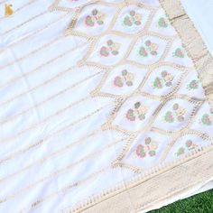 Elevate your style with our Pure Georgette Silk Meenakari Banarasi Dupatta. This luxurious Banarasi dupatta showcases intricate Meenakari work, adding timeless charm and regality to your ensemble. Celebrate Banaras' artistry and heritage. Can be dyed in any color of your choice. Unstitched Kundan Anarkali Set With Pallu, Anarkali Chanderi Dupatta With Cutdana, Anarkali Traditional Wear With Chikankari Embroidery In Dola Silk, Dola Silk Anarkali With Chikankari Embroidery, Semi-stitched Anarkali Dupatta With Cutdana, Transitional Dola Silk Unstitched Suit With Chikankari Embroidery, Transitional Chikankari Embroidered Unstitched Dola Silk Suit, Festive Chikankari Embroidered Dupatta, Traditional Kundan Unstitched Suit For Diwali