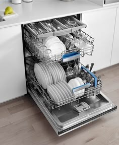 an open dishwasher with dishes in it