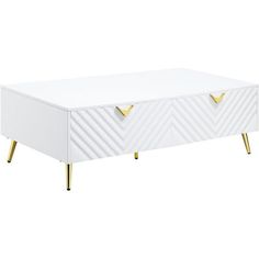 a white and gold coffee table with two drawers