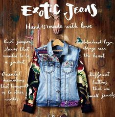 a denim jacket hanging on a wooden wall with the words exotic jeans written below it