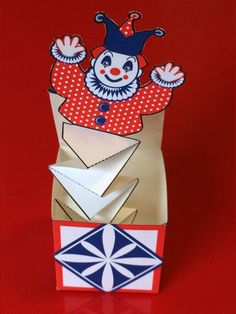 an origami box with a clown on it