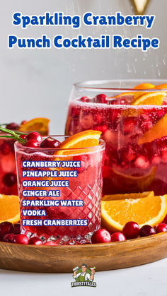 sparkling cranberry punch cocktail recipe on a platter with orange slices and cranberries