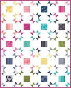 a colorful quilt with many different shapes and sizes