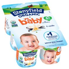 three boxes of stonyfield organic baby diapers, each with an image of a smiling child