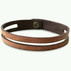 two brown leather bracelets on white background