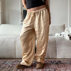 Low rise beige 100% silk lounge pants, baggy cut with drawstring waist. Marked size medium. 32 inch waist, 26 inch inseam. Model is 5ft/26 waist 
#coquette #vintage #sleep #casual #clean Silk Lounge Pants, Pyjama Pants, Coquette Vintage, Pants Baggy, Womens Trousers, Pajama Pant, Silk Pants, Lounge Pants, 90s Vintage