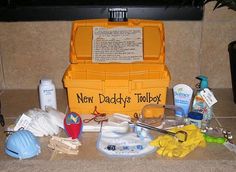 the new daddy's toolbox is full of baby items