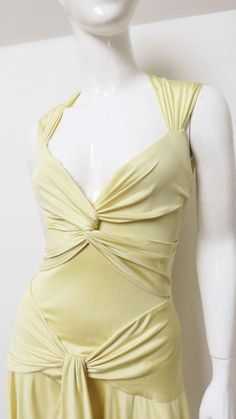 For Sale on 1stDibs - A gorgeous yellow fine silk knit dress by Valentino. It is semi fitted, sleeveless with a V neckline and ruched panels across the bust and hips. The skirt Ruched Dress Pattern, Low Waist Dress, Vintage Yellow Dress, Yellow Silk Dress, Dresses Colors, Silk Yellow Dress, Valentino Runway, Vintage Dress Design, Rouched Dress