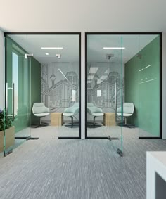 an office with green walls and glass doors