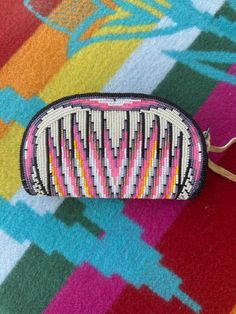 Pink Coin purse L: 6 inches W: 3.5 inches Materials: Deer Buckskin lining, Cut beads An Authentic made Shoshone Designed coin purse made by Margie Whitehorse, a Shoshone-Bannock Tribal Member and family member of Whitehorse and Family. Cut bead colors are pink, white, purple, cream, black, and yellow. Art Color, Black And Yellow, Color Palettes, Family Members, Bead Work, 6 Inches, Pink White, Beading, Deer