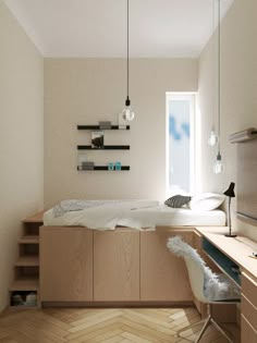 a bedroom with a bed, desk and shelves on the wall next to a window