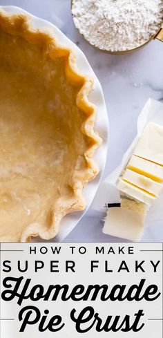 an uncooked pie crust next to butter and other ingredients on a marble table