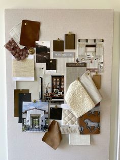 a white wall covered in lots of different types of pictures and things to put on it