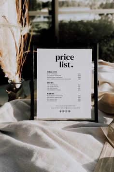 a price list sitting on top of a table