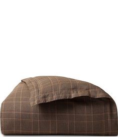 a brown and black checkered comforter on a white background