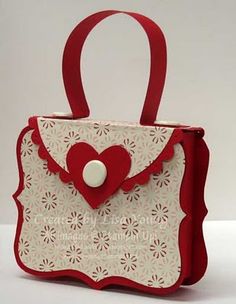 a red and white bag with a heart on it