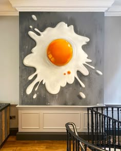 an egg shell is painted on the wall