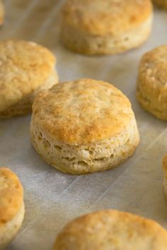 some biscuits are sitting on a baking sheet