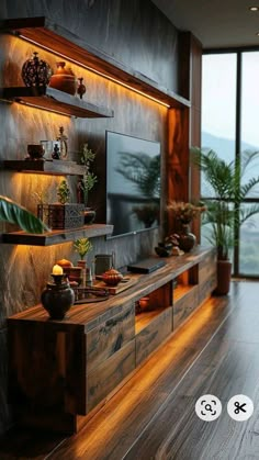 a living room with wood flooring and built in shelving unit on the wall