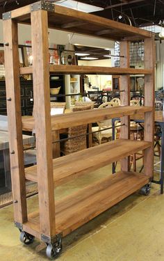 a large wooden shelf sitting inside of a store