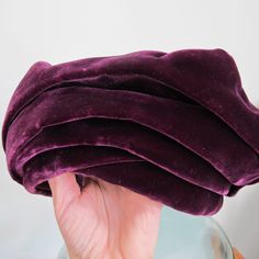 Purple Velvet 40's to 50's Turban Lady's Hat. Woodward & Lothrop Fashion Accessory. Vintage Fashion Hats, Plum Velvet 30's to 50's Style Time Period Hat, union label under that big Woodies Label. With age wear, and just overall as is, needs steam pressing.  21 5/8 IN inner circumference  Front 4 1/4 IN Height  With age and wear, please view all pics and zoom in. Adjustable Purple Evening Hat, Velvet Red Hat, Purple Hat Ladies, Vintage Purple Round Jewelry, Vintage Short Brim Purple Hat, Roaring 20s Fashion, Large Brim Hat, Types Of Hats, Turban Style