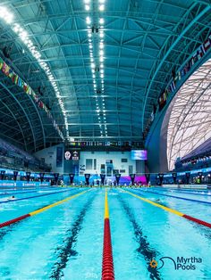 an indoor swimming pool with no people in it