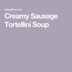 creamy sausage tortellini soup is shown in white text on a gray background