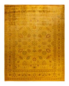 an antique rug with yellow and red colors on the bottom, surrounded by smaller floral designs