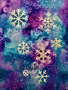 snowflakes on purple and blue watercolor paper