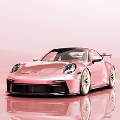 a pink sports car on a reflective surface