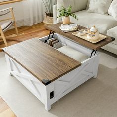 a coffee table with storage underneath it in a living room