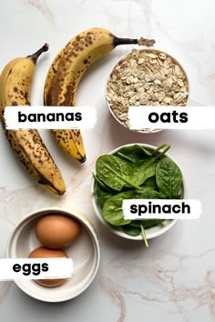 bananas, oats, spinach, eggs and spinach on a marble surface