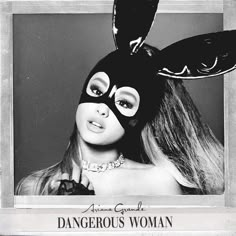 an ad for dangerous woman with a bunny mask on it's face and long hair