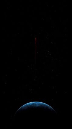 an image of the earth from space with a red streak in the sky above it