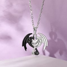 Can you believe it? This dragon couple's relationship is one of the strongest romance relationship in the fictional world. Crafted in sterling silver, this necklace in Hug Me® collection shows a loving dragon couple hugged a heart-cut stone together. As a great Valentine and Christmas gift, the meaningful necklace celebrates your everlasting love. You will find more adorable and creative designs in our Hug Me® collection.Carat Weight: 0.5 ctStone Size: 5*5 mmStone Type: Jeulia® StoneNumber of St How To Train Your Dragon Necklace, Dragon Couple, Couple Heart, Meaningful Necklace, Princess Jewelry, Teen Outfits, Dragon Necklace, Couple Necklaces, Couple Relationship