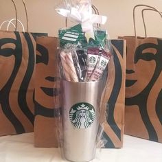 the starbucks cup is full of candy and cookies