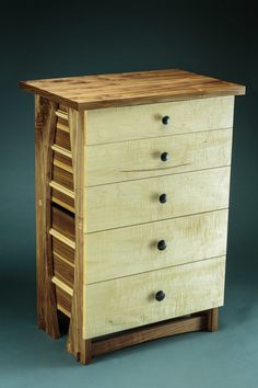 an unfinished chest of drawers made from wood