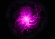 an abstract purple and black background with swirls in the center, on top of a dark surface