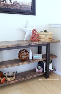 a wooden shelf sitting on top of a hard wood floor next to a white wall