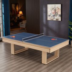 two ping pong tables in a living room