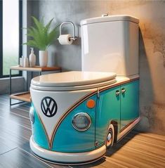 a blue and white vw camper toilet sitting on top of a wooden floor