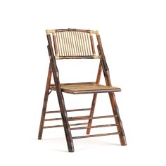 a wooden folding chair with wicker seat and back rests against a white background,