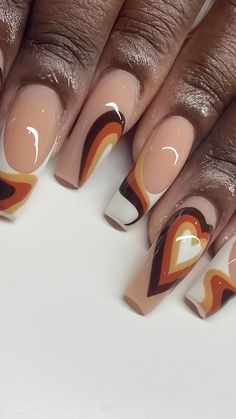 The retro waves of the '70s are given a contemporary twist in this nail idea. Smooth caramel tones are layered with curving shapes in shades of orange, white, and black. There’s a sense of nostalgia here, but with a modern edge that speaks to the revival of past eras in the language of today’s fashion. These nails are for those who revel in the echoes of yesteryear, yet look forward to the promise of tomorrow. Fall Short Nail Designs, Vintage Nail Art, Cozy Colors, Cheetah Print Nails, Trendy Nail Designs, Fall Nail Ideas, Retro Nails, Art Deco Nails, Graduation Nails