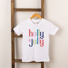 Looking for a cute tee for your kids? We have the perfect Holly Jolly graphic tee addition to their closet! Holly Jolly, Short Sleeve Tee, Same Day Delivery, Graphic Tee, Top Shirt, Graphic Tees, Target, Drive, Top Outfits