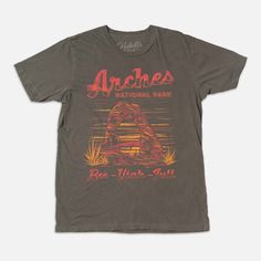 You'll love this super soft Arches National Park tee, featuring a hand illustrated image. Artwork is slightly distressed, printed in Los Angeles, and sits on a soft vintage style tee. * 100% Cotton * Sizing is Unisex * Garment Dyed * Made in USA National Parks | Hiking | Backpacking | Travel | Fashion | Contemporary | Utah | Sustainable | Eco-Friendly | Small Batch | Arches | Zion Acid Wash Tri-blend Graphic Tee, Acid Wash Graphic Tee With Graphic Design, Acid Wash Graphic Tee With Design, Vintage Screen Print T-shirt, Acid Wash Graphic Tee, Hiking National Parks, Hiking Backpacking, National Parks Usa, Arches National Park